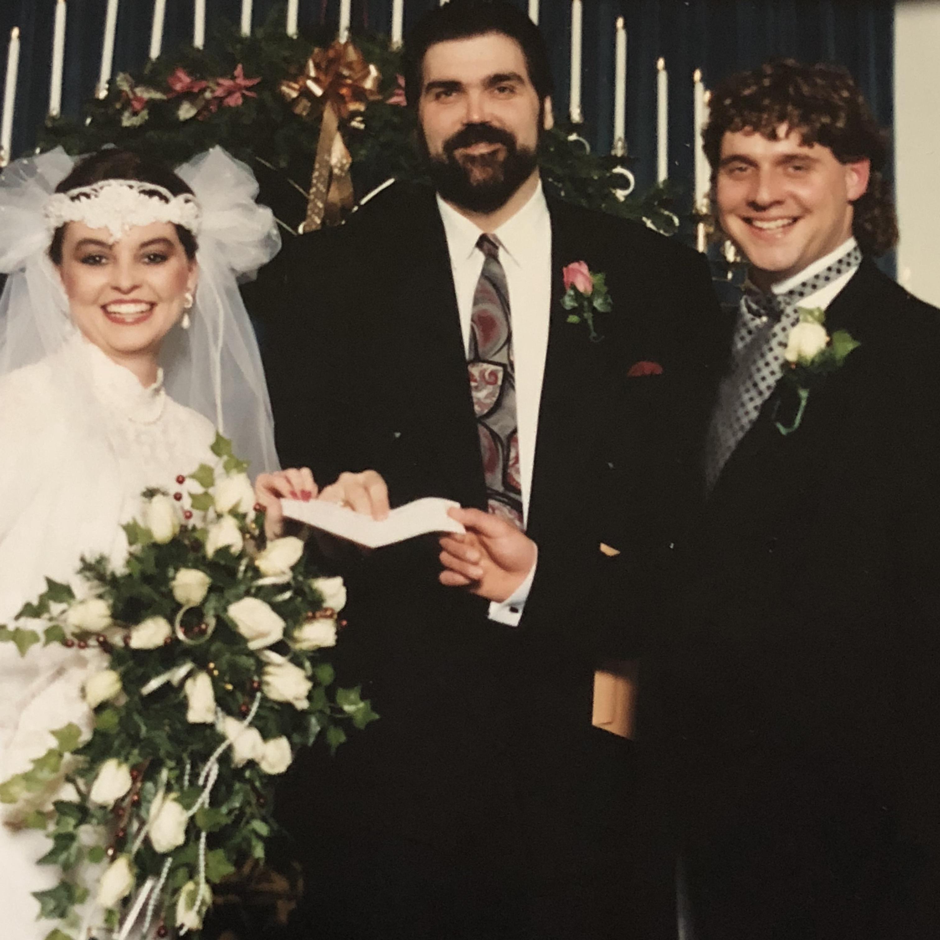 Jesse's parents with their Officiant!