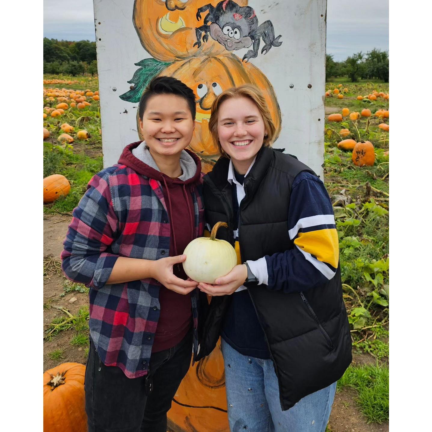 Our little baby pumpkin the year we went picking for Halloween!