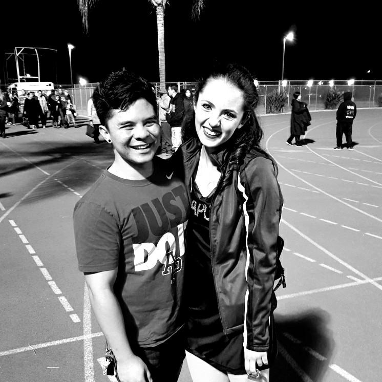 Our first photo together as a couple feat. Teal on the dance team and Nick with earrings