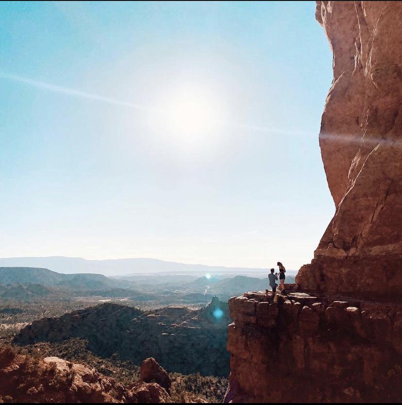 Ryan proposing at Cathedral Rock, photo taken from a stranger