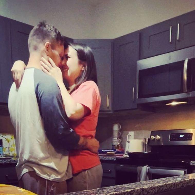 Dancing in the kitchen together.