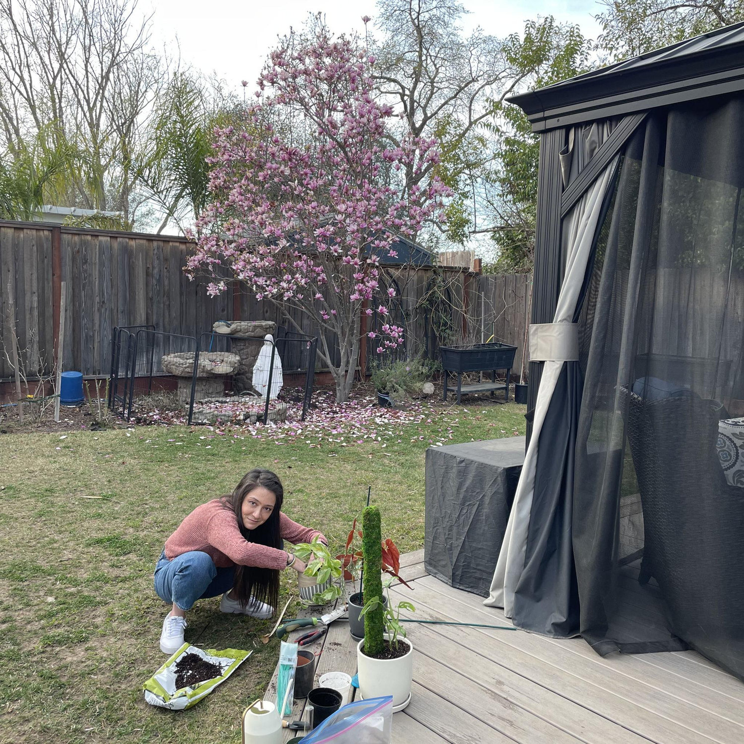 Jenna tending to her plant children, a hobby that would soon infiltrate Hazy's hobbies.