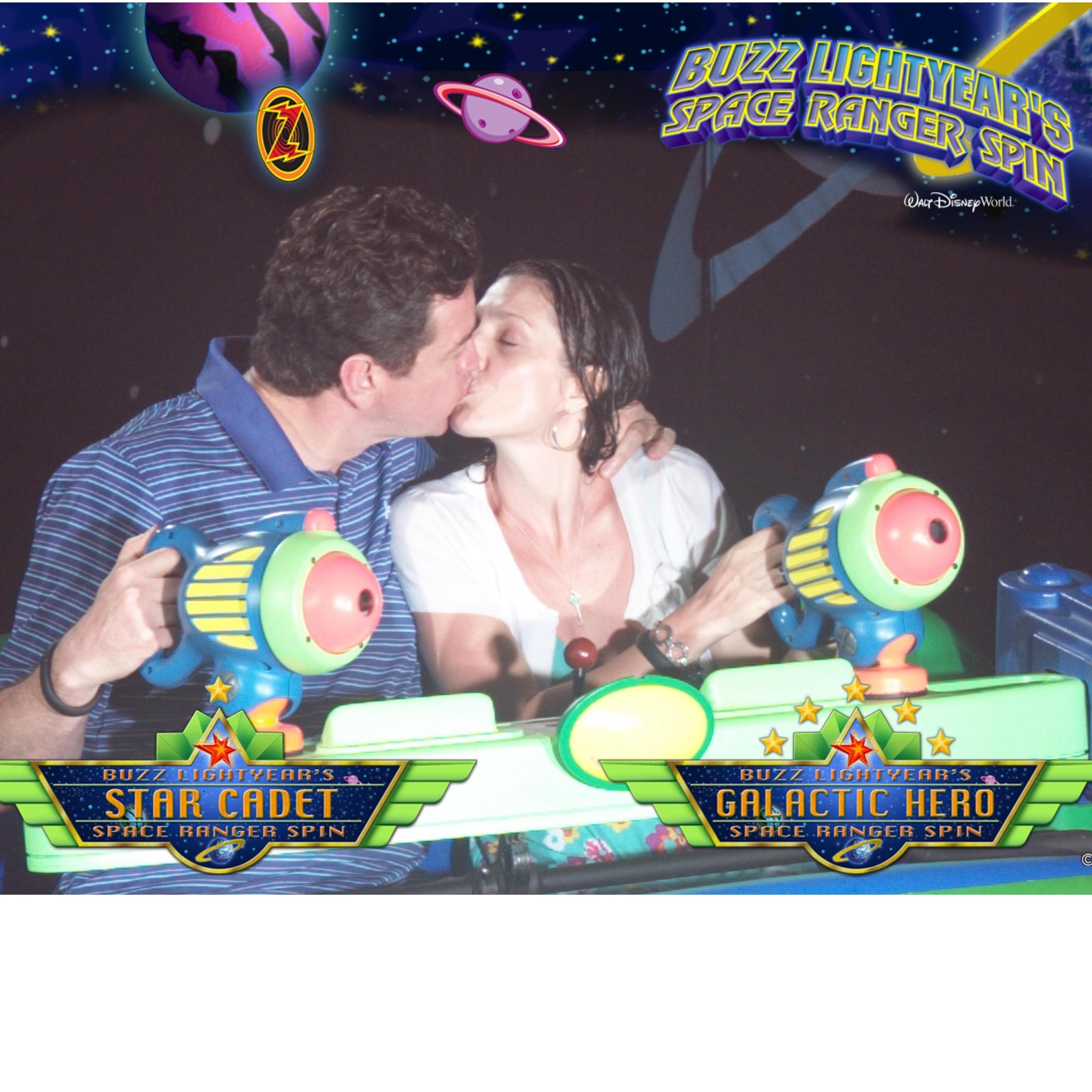 Our first time at WDW. We got caught in a down pour and sought comfort in Space Ranger Spin where I beat the Kevin and became a Galatic Hero for the first time. 999,999. This was June 2013.