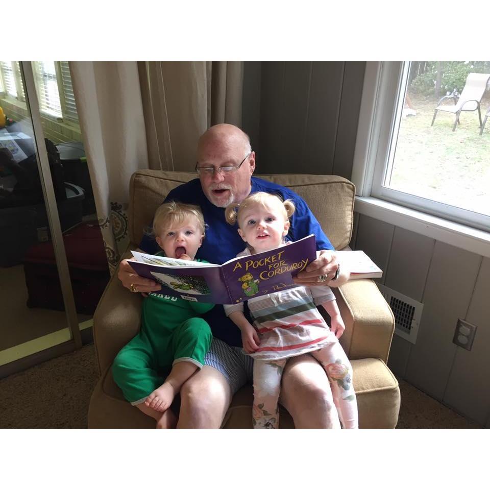 Uncle Mark reading to Lincoln & Livia
