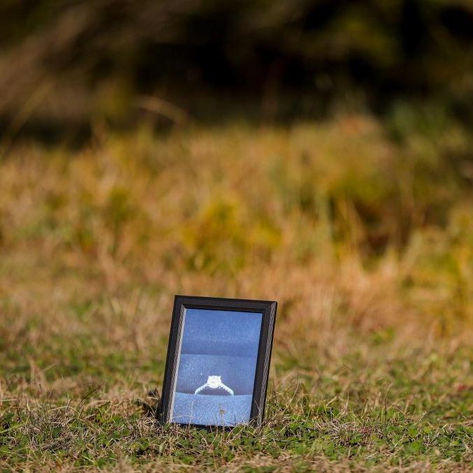 Timothy had 10 pictures/memories along the driveway of CeCe and Papa's house when he proposed. One of those was a picture of the ring that he sent me within 10 minutes of the purchase :)