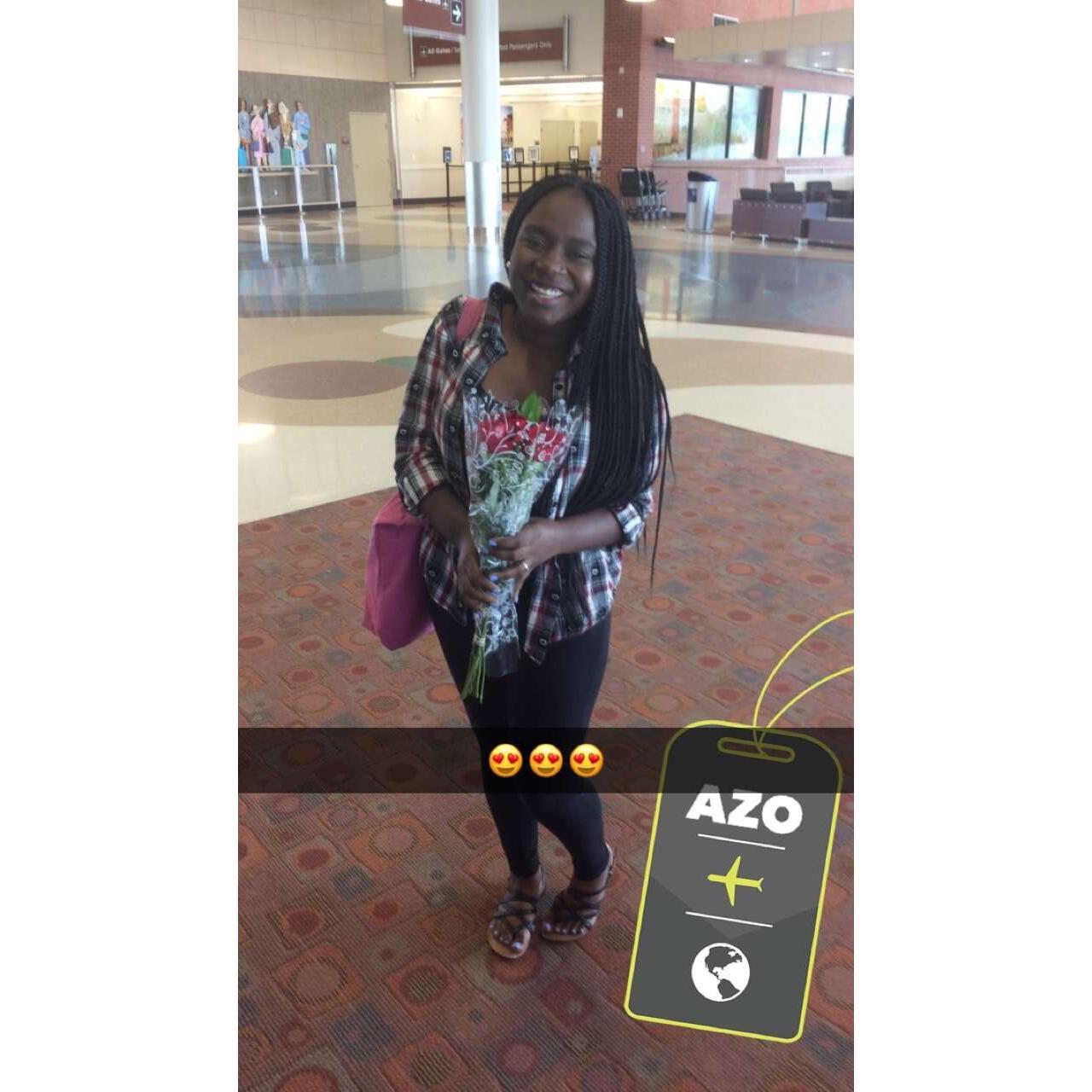 6/2/2018: Joshua surprises Marleca with flowers, as she touches down in Kalamazoo, MI.