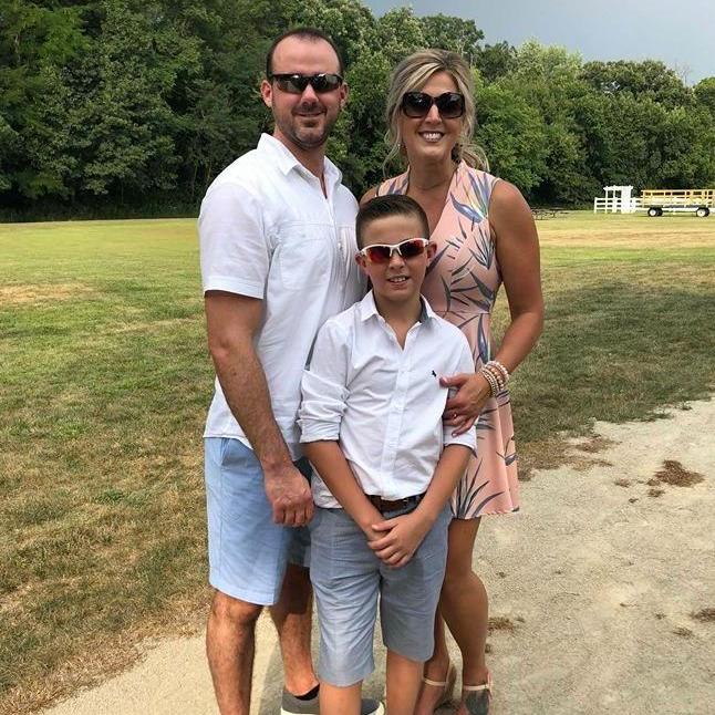 Who's the third wheel in this wedding trio?