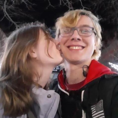 Cheeky kiss on our first date! December 27th, 2021 at the Ice Rink in South Haven.