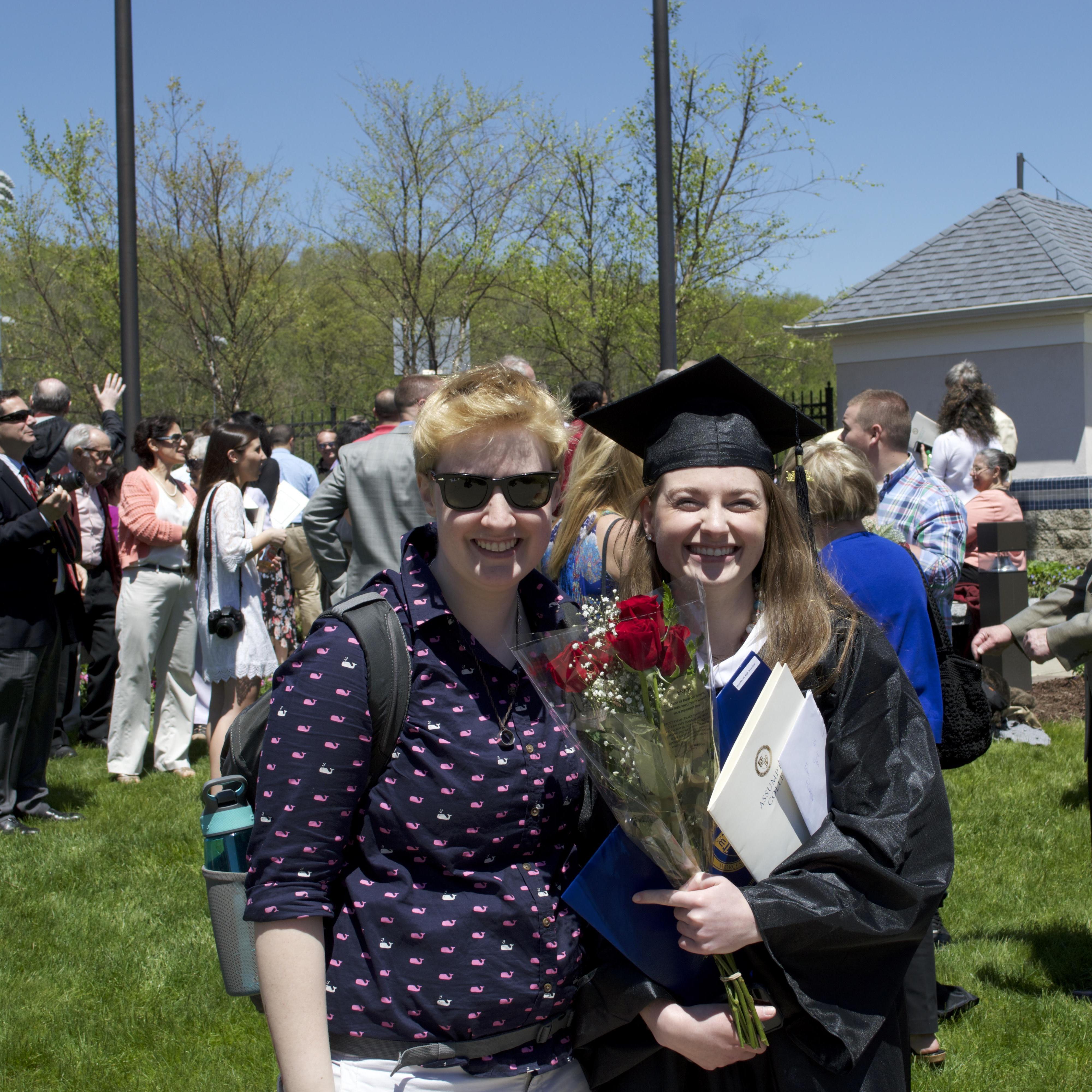 Here we are at Jen's Bachelor's degree graduation in 2014. Go Hounds!