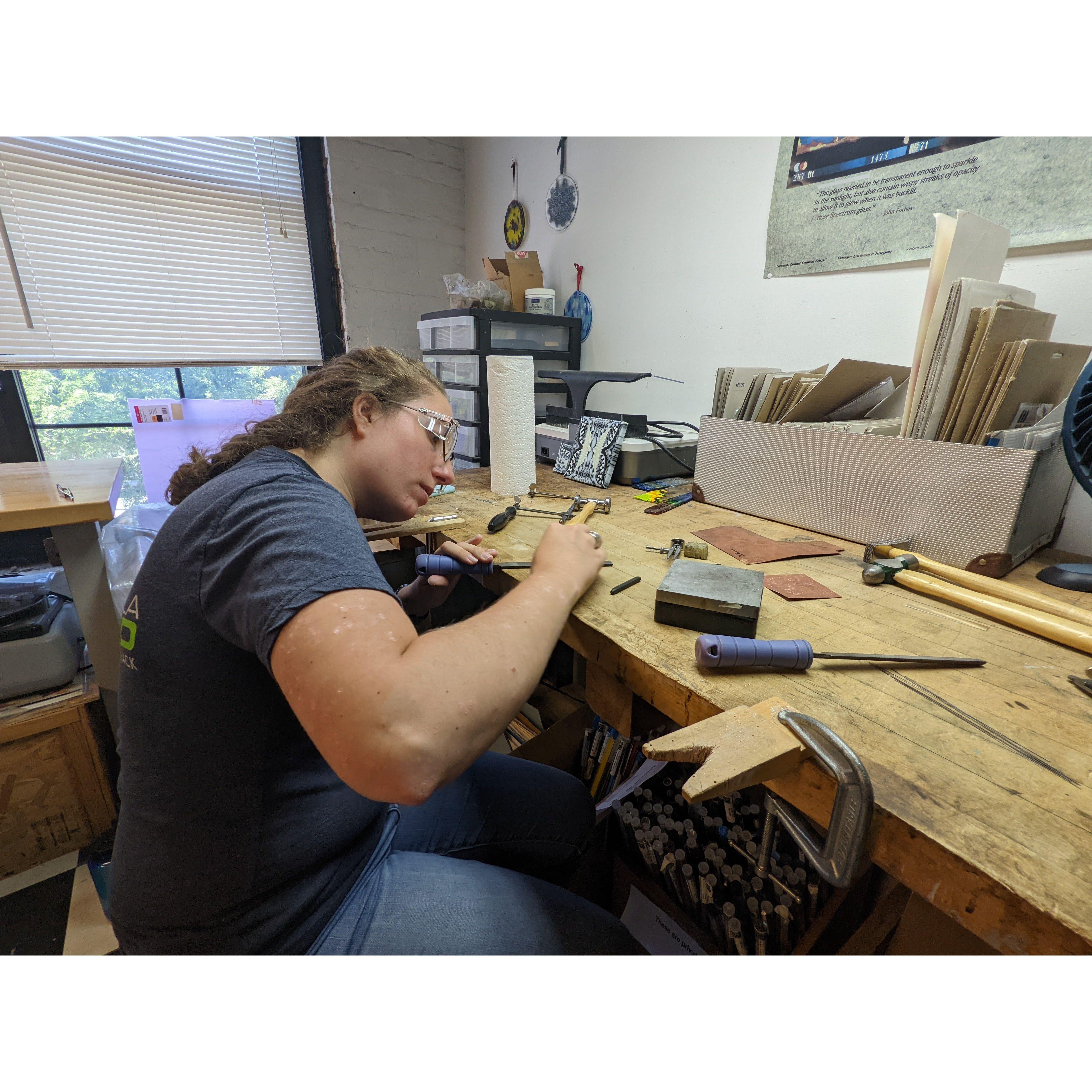 Zoe similarly hammering away.