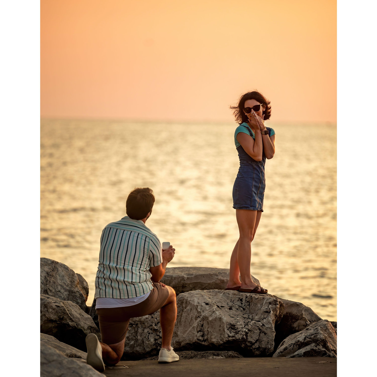 Lex's shock at turning around to Ayden down on one knee popping the question!