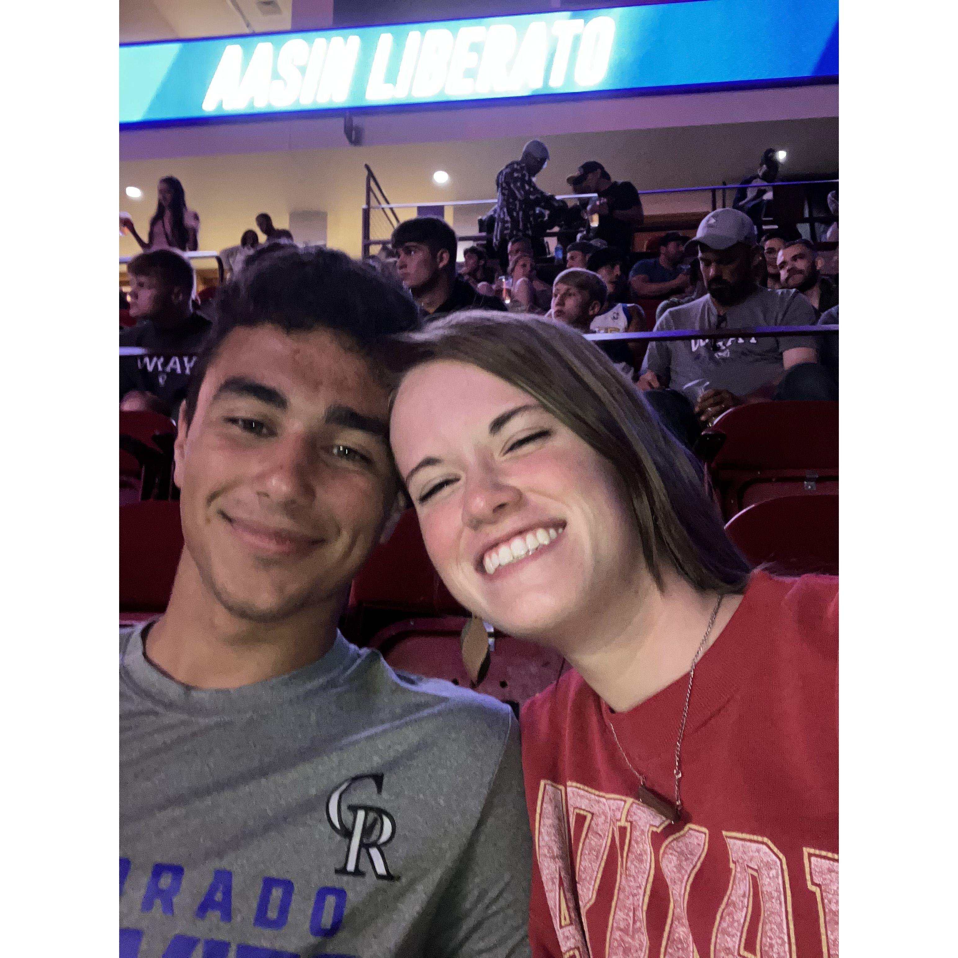 Date night at an MMA fight during the first few months of dating.