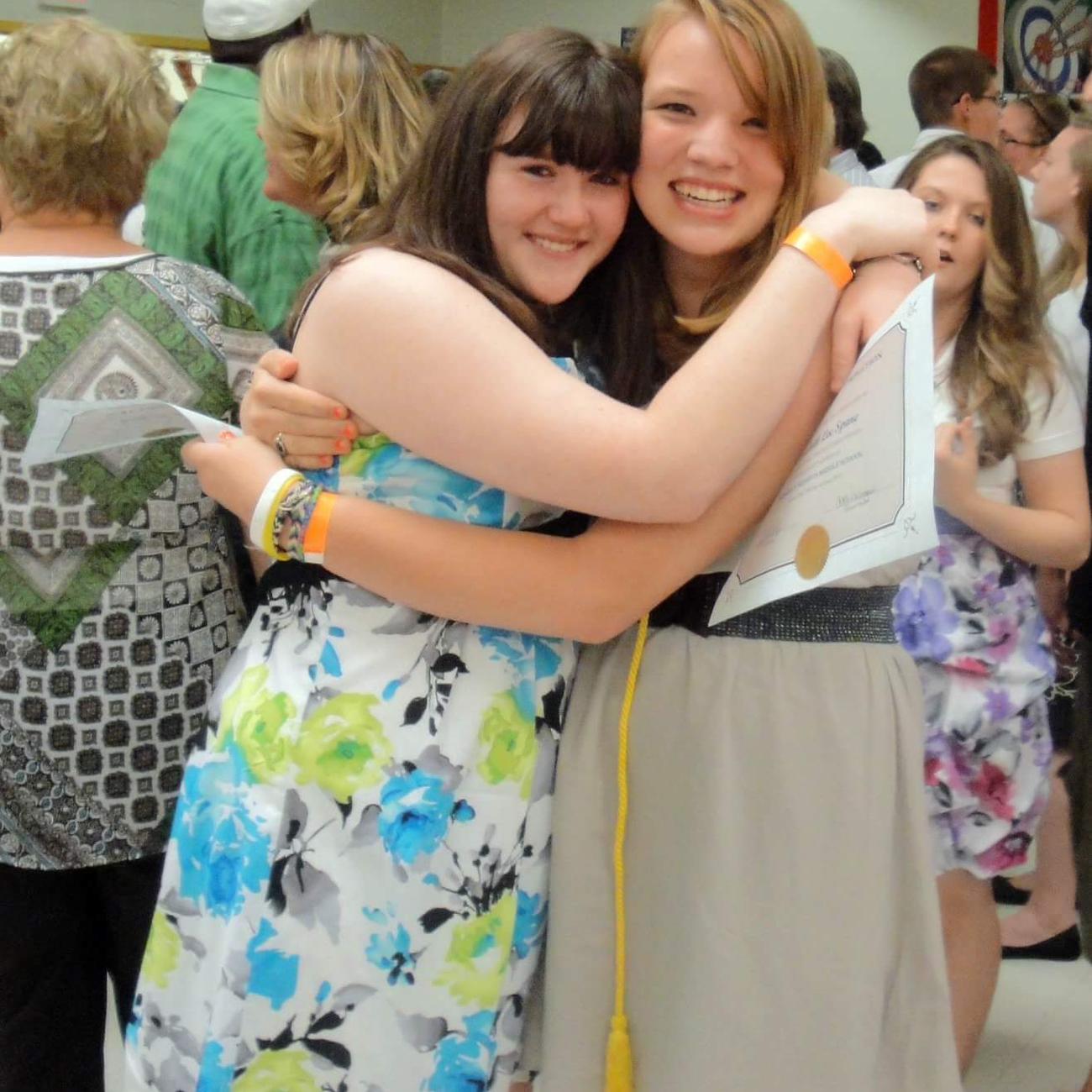 This picture is of my maid of honor and me at our middle school graduation. We've been the best of friends since second grade, and I couldn't be more thrilled to have her by my side on my wedding day!