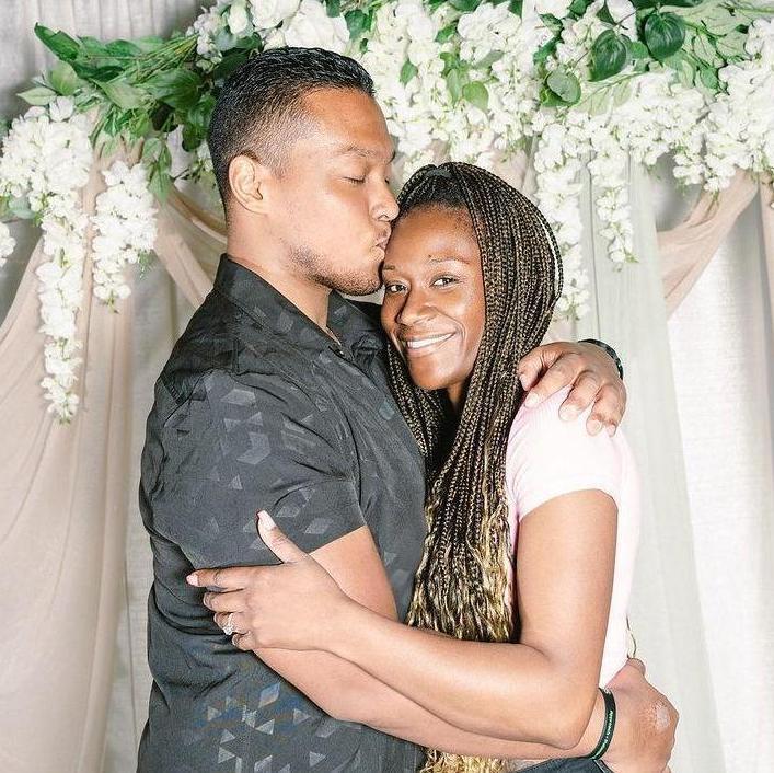 Ty showing Mandy love at a wedding expo