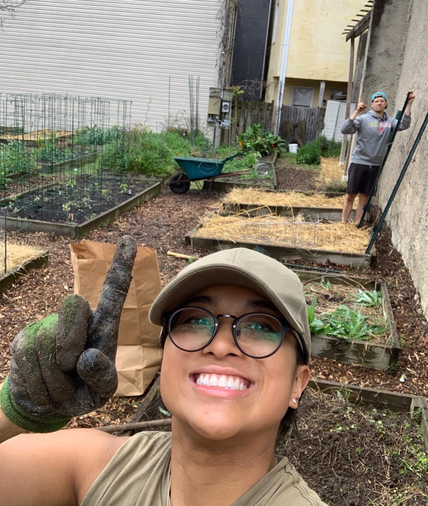 Planting vegetables at our community garden plot in Federal Hill