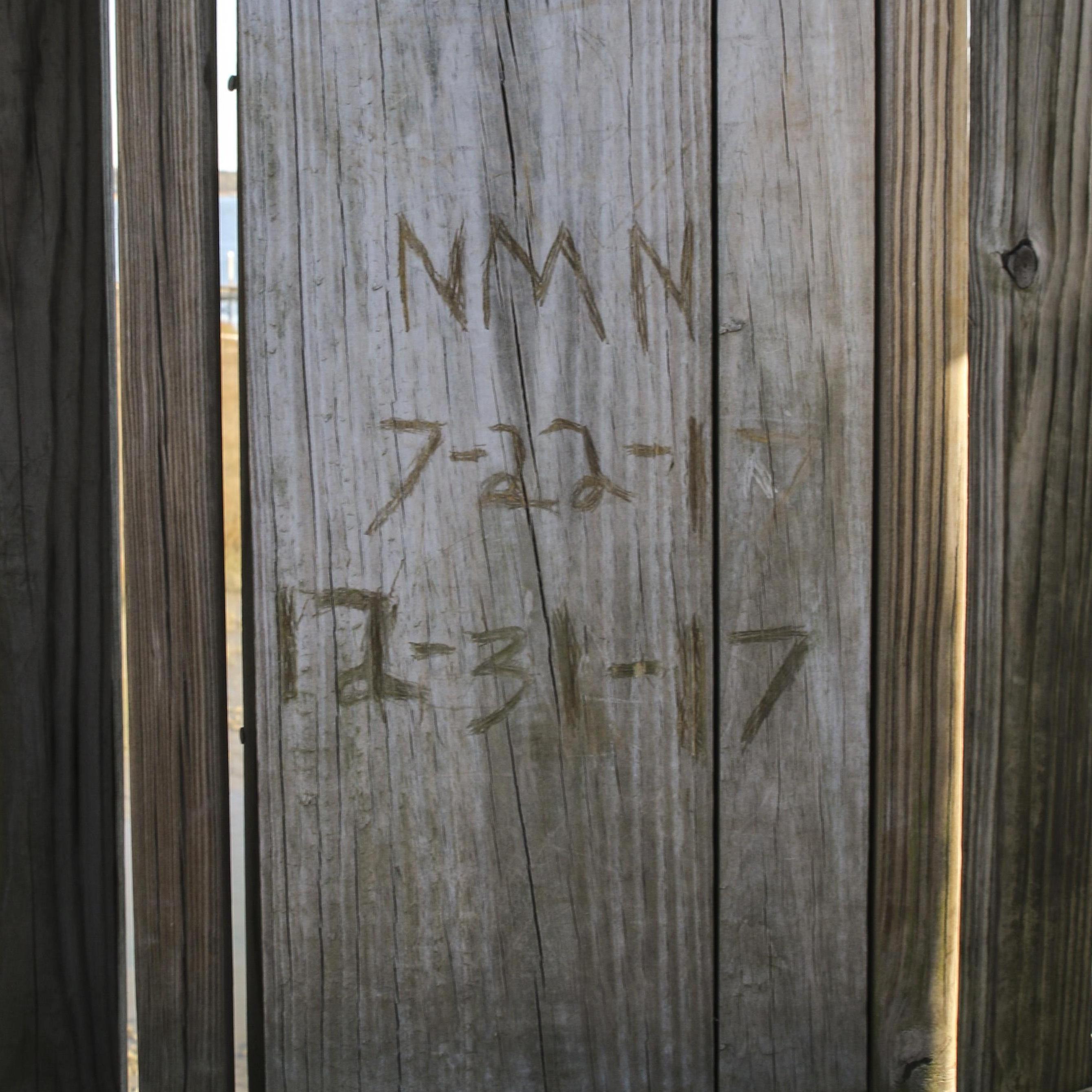 He carved this on our first date right before we had our first kiss. We came back and he wrote the day he proposed.
