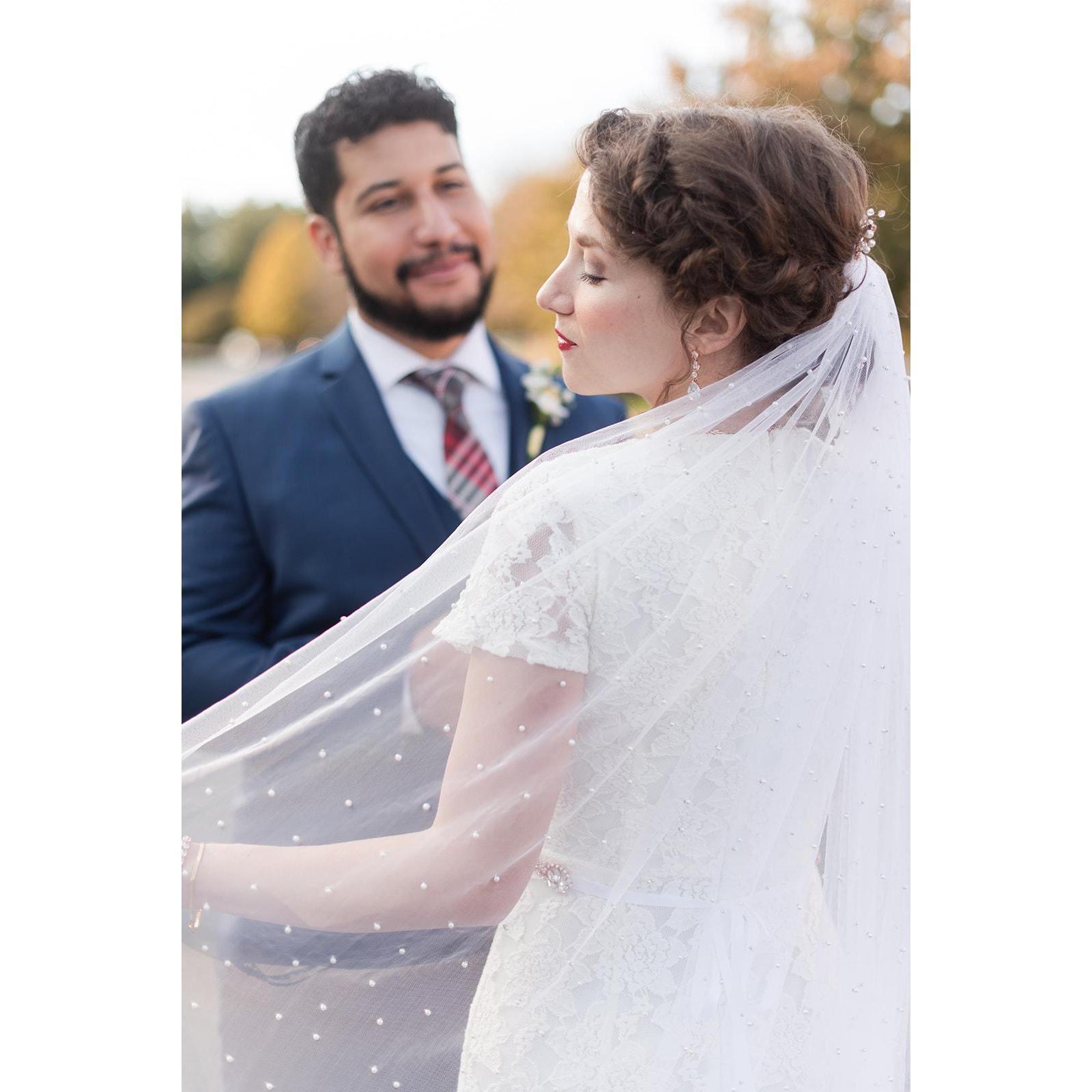 And her veil was covered in pearls.