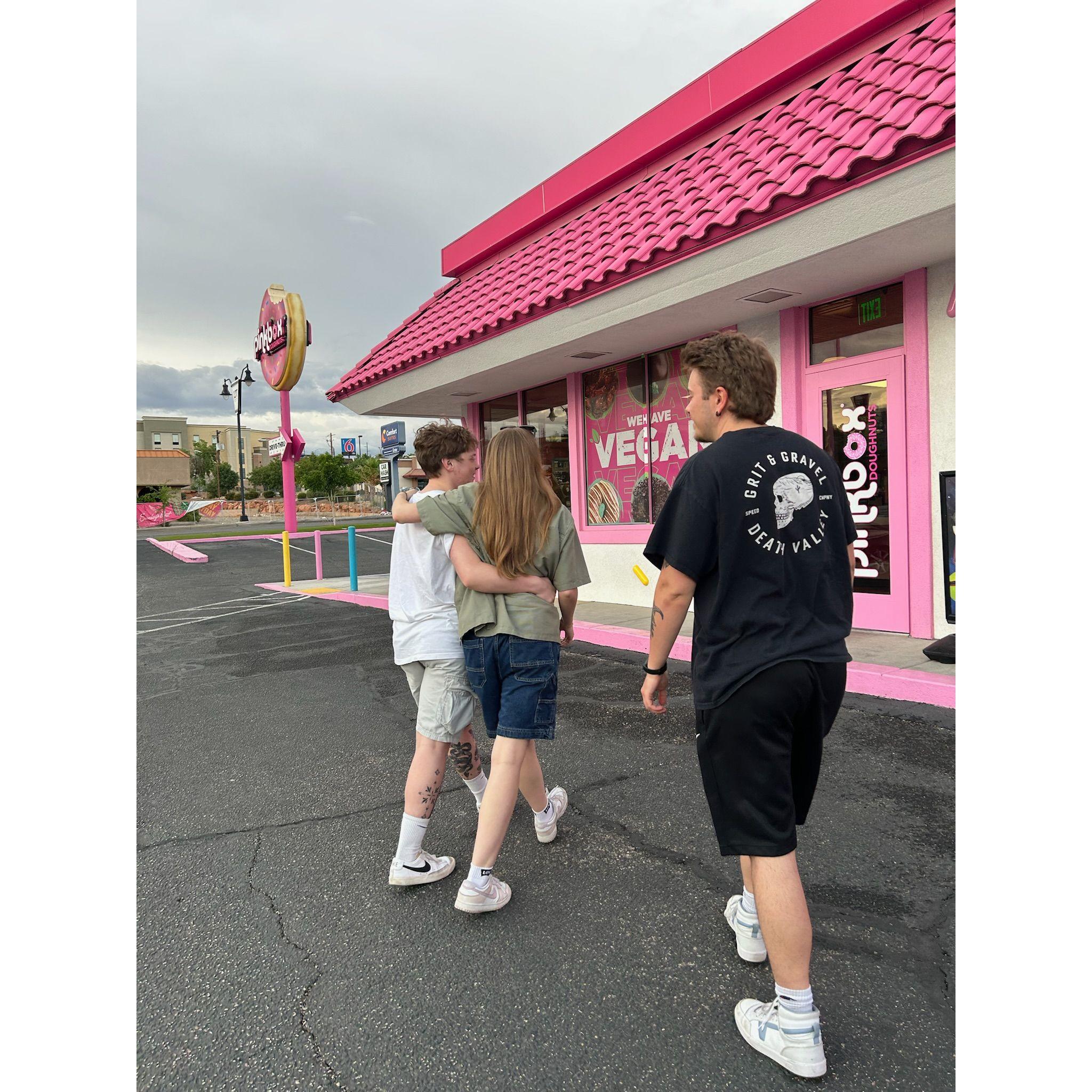 Walking in stride with each other on our way to get donuts for the road back up to SLC.