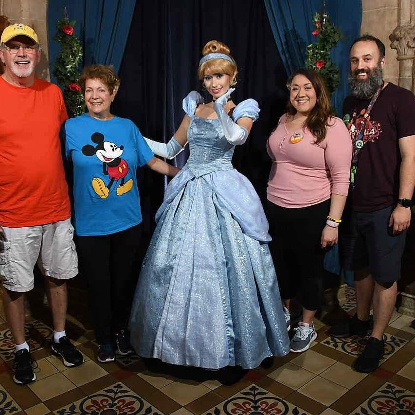 Being welcomed to Cinderella's Castle for lunch by the Princess herself