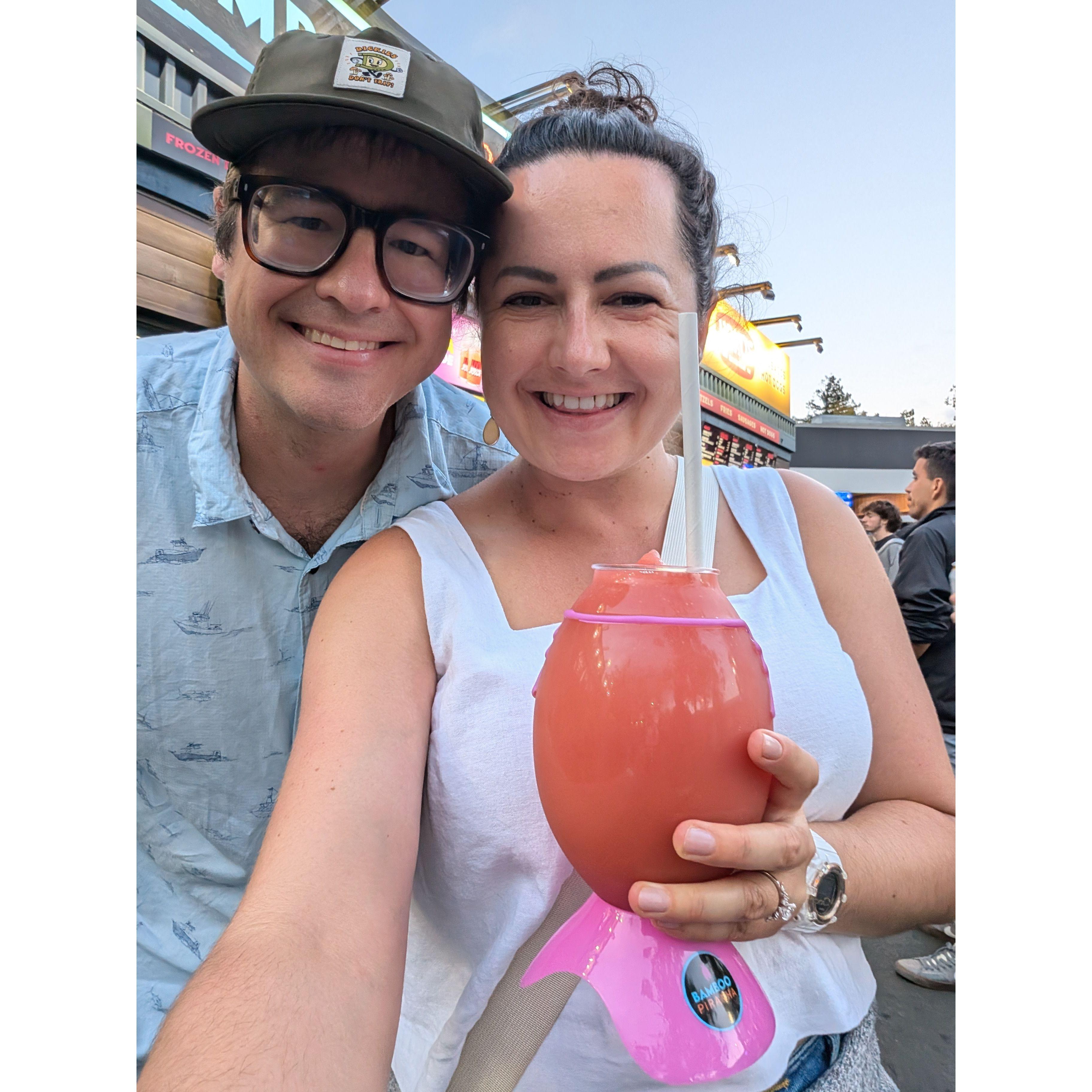 Trying a watermelon margarita at a shoreline concert for Vira's birthday