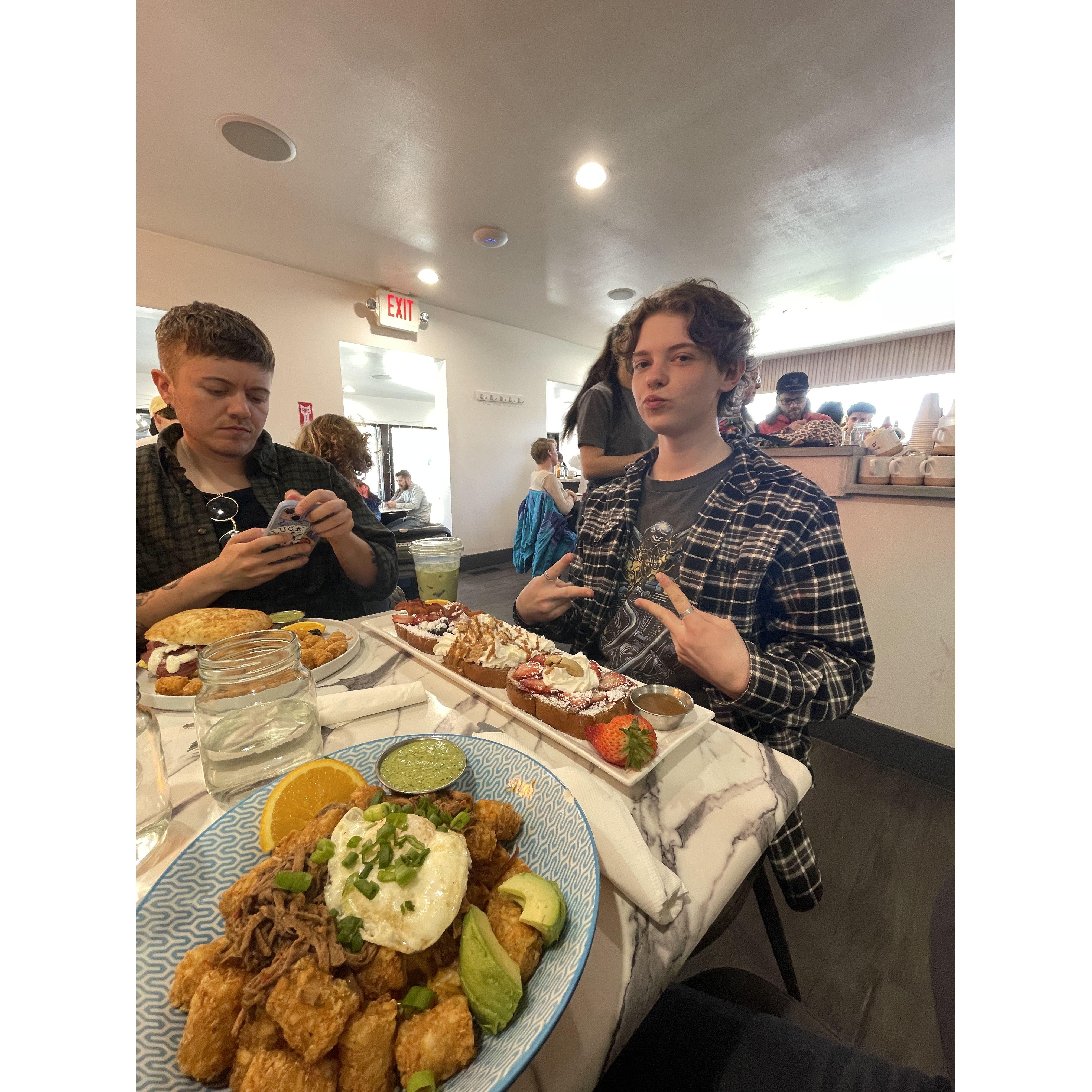 Celebrating Reed's birthday and finally moving in together by having breakfast with our friends at Skillets!