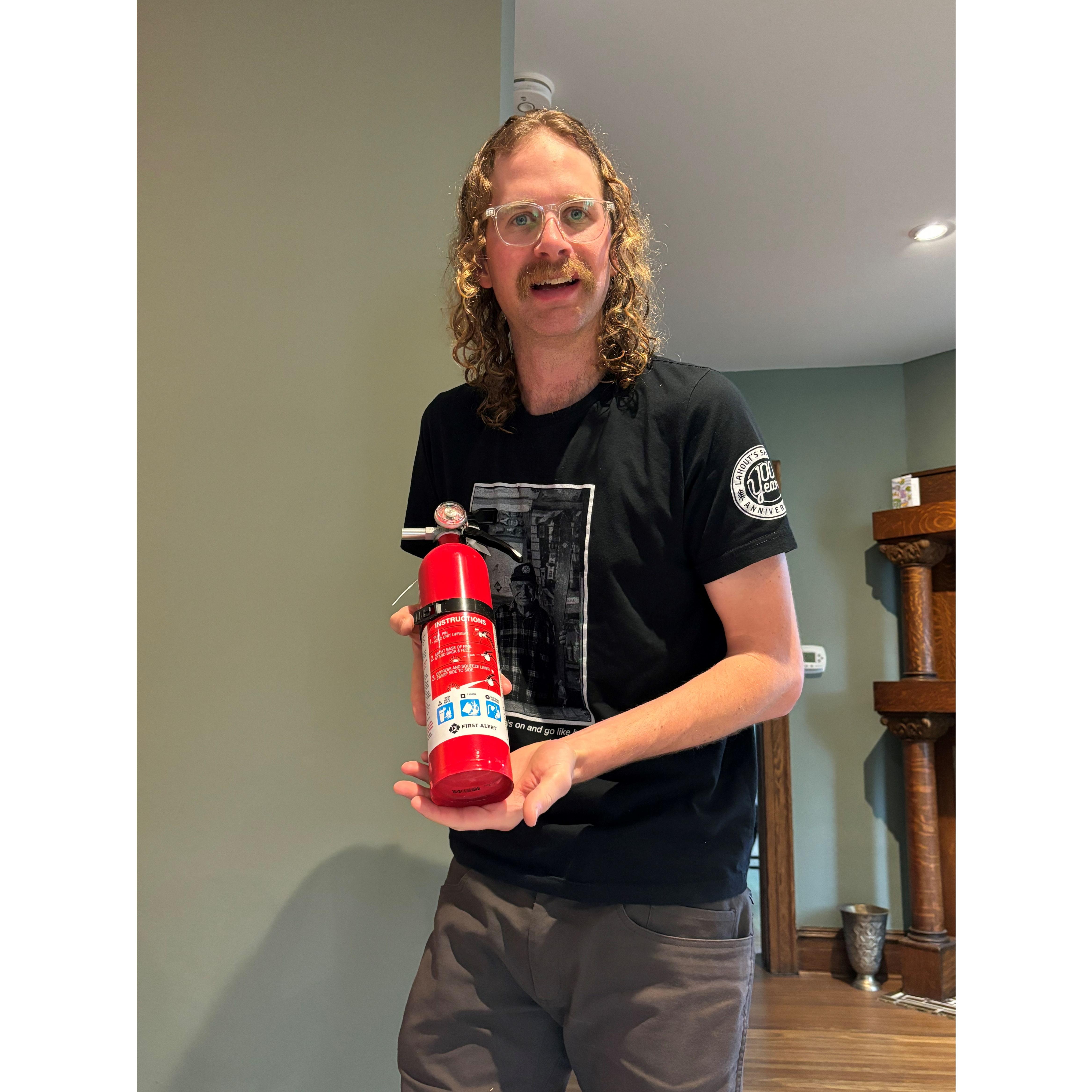 Instead of wine, Drew bought Eliza fire extinguishers for every room of the house for her birthday.