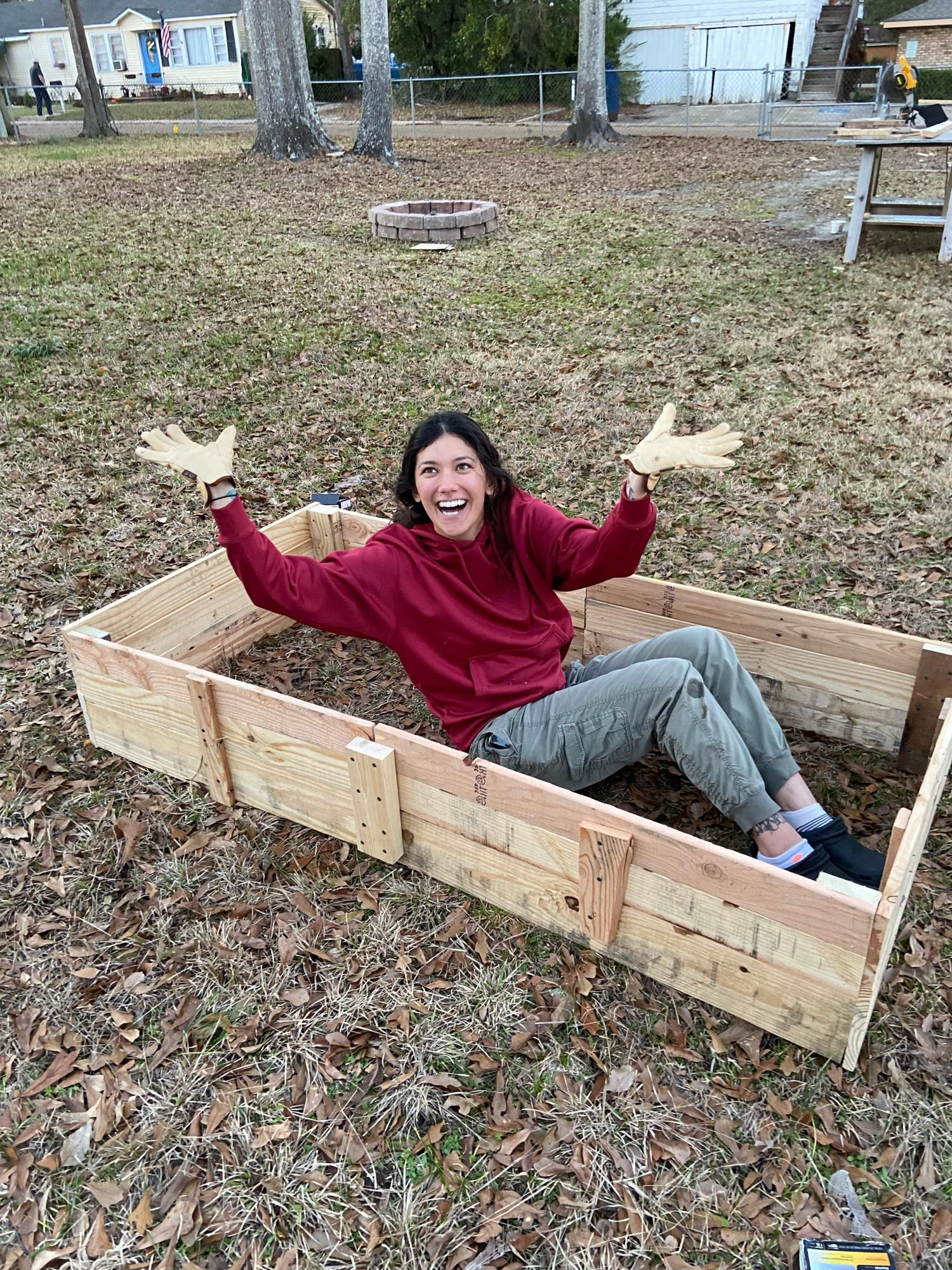 We built plant beds out of pallets and Jasmine was modeling them as a flower photosynthesising