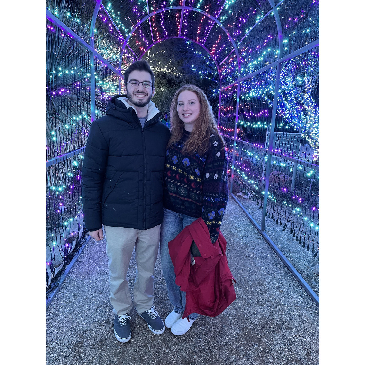 Our first photo together, on our second date at the Tucson Botanical Garden during Christmas time.