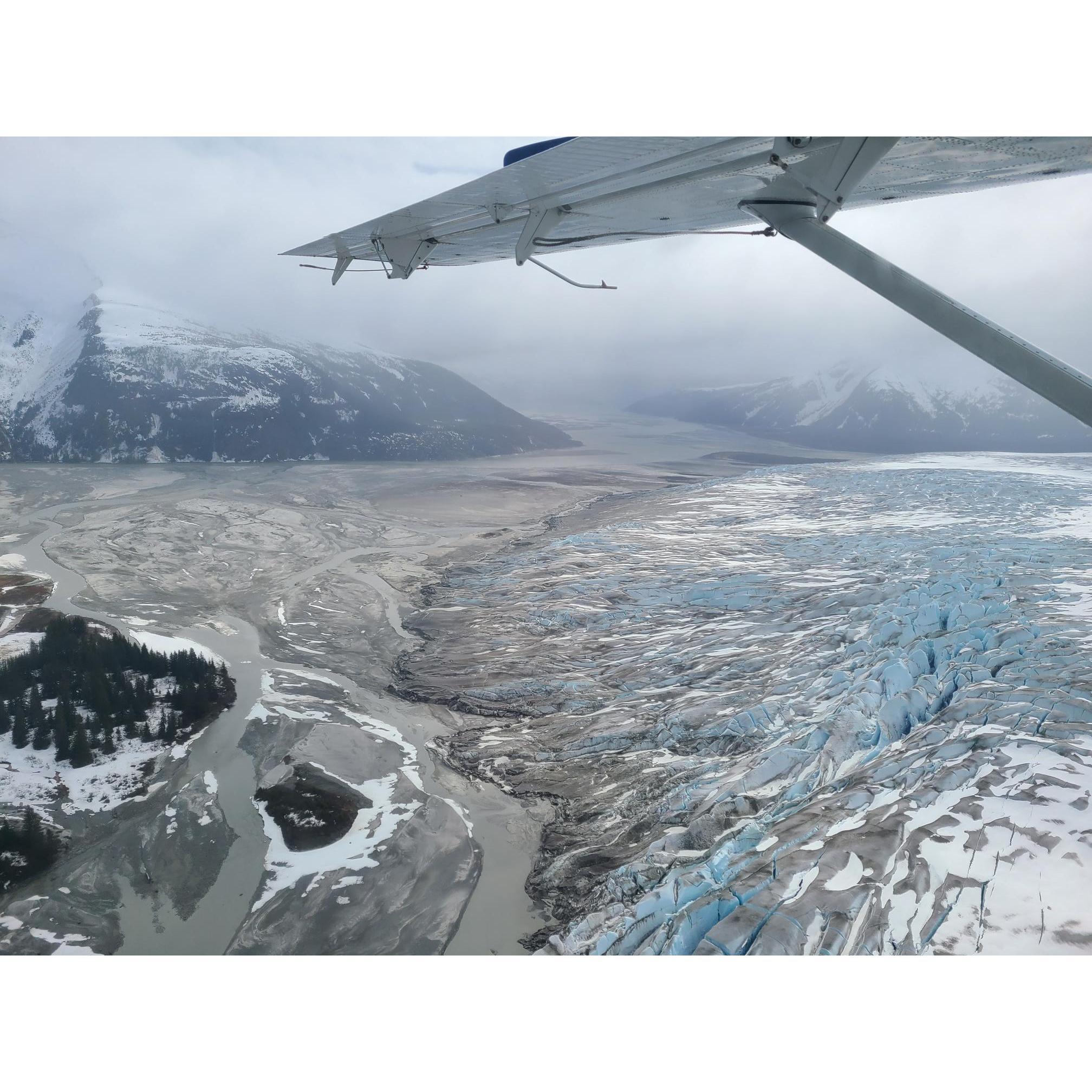 flying over glaciers on the way to Taku Glacier Lodge