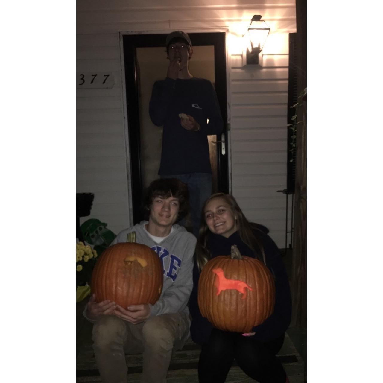 Our first time carving pumpkins together, this photo features Quade, the best man, doing what he's always doing - eating! October 29, 2017