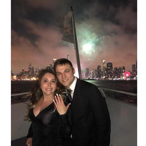 Our engagement on January 1st, 2020 on the Anita Dee on Lake Michigan, just after midnight!