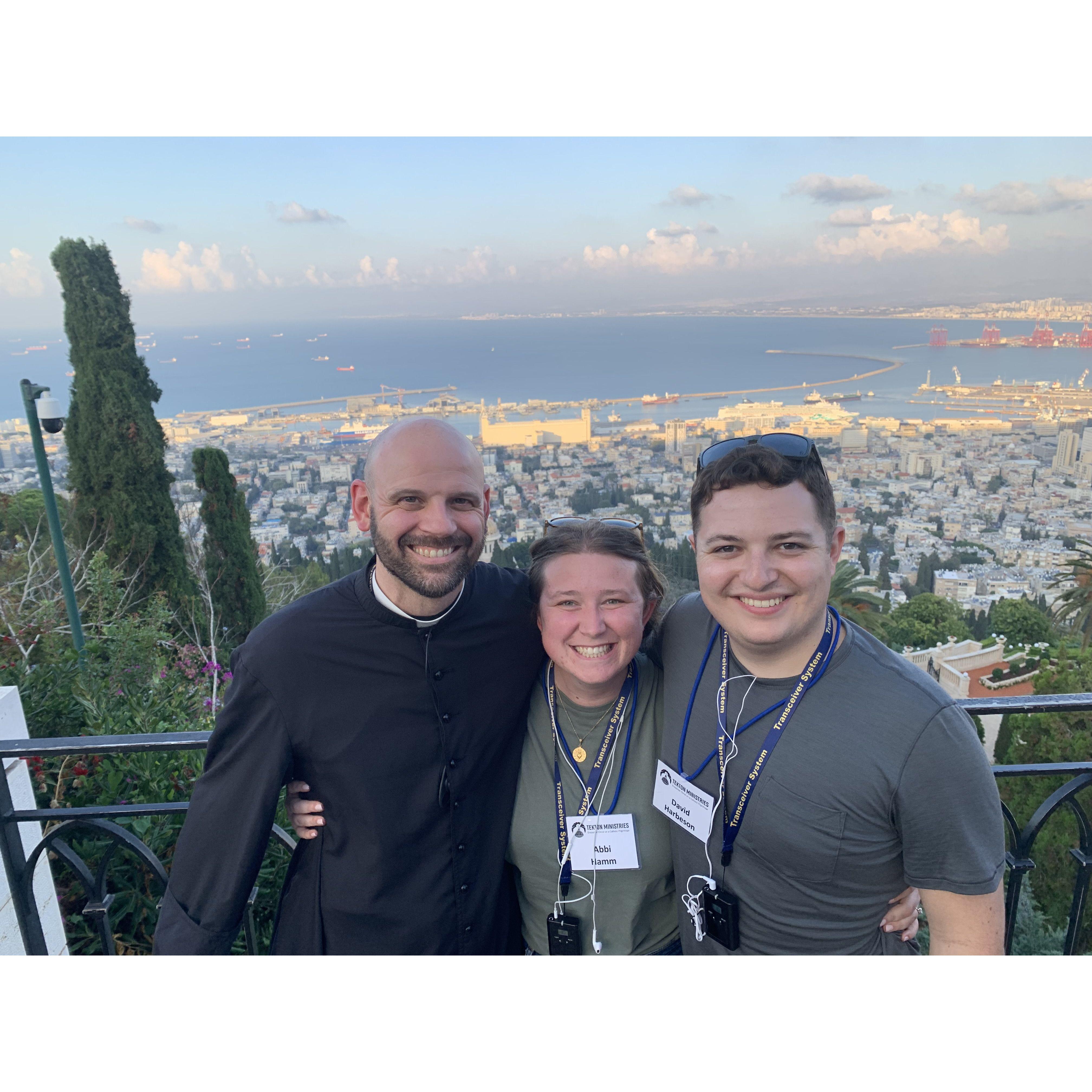 Abbi and David with their pastor, Fr. Jeremy, on their trip to the Holy Land.