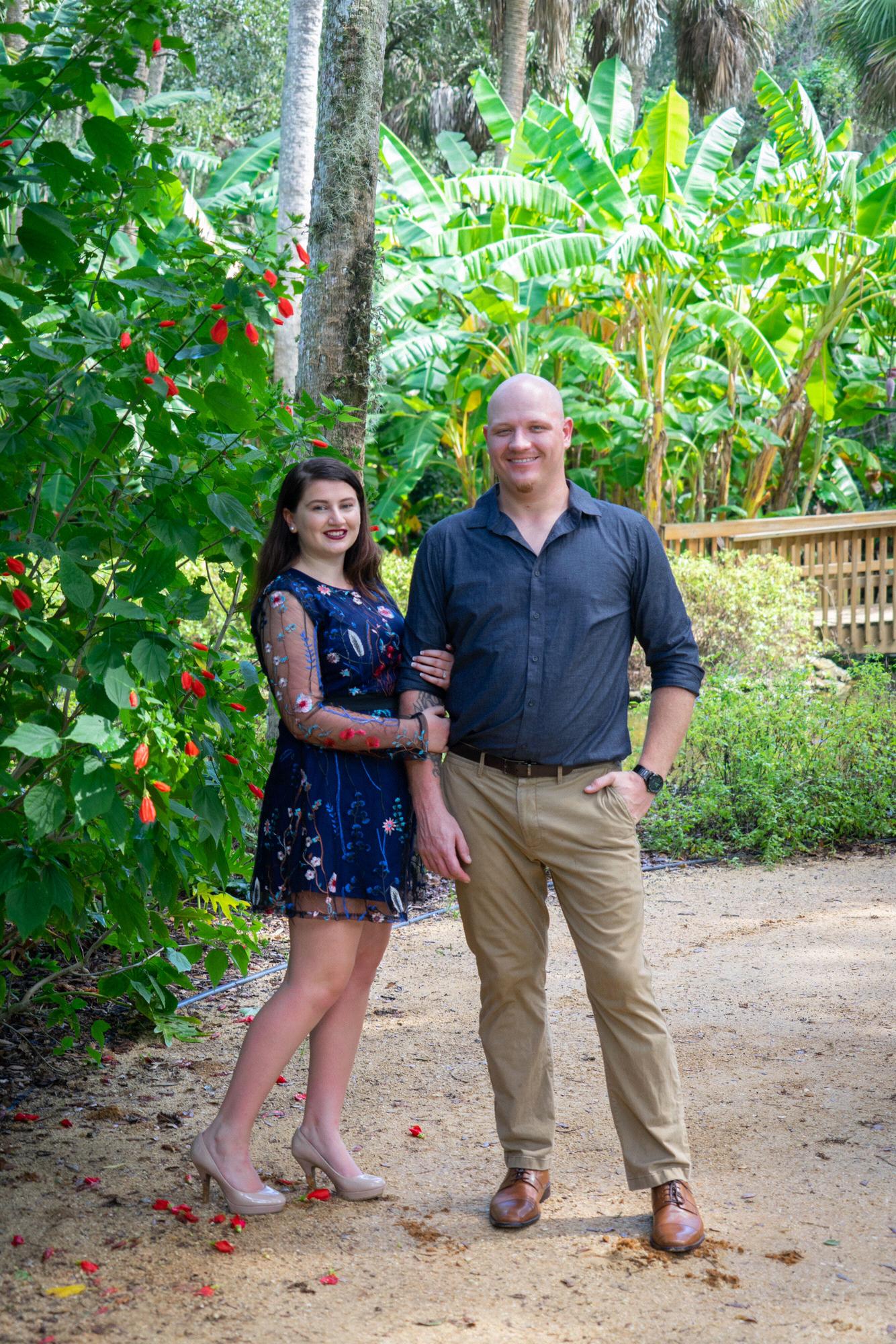 You can't tell, but Kayla's high heels kept sinking in the sand so she had to hold onto Nate's arm to keep from falling over.