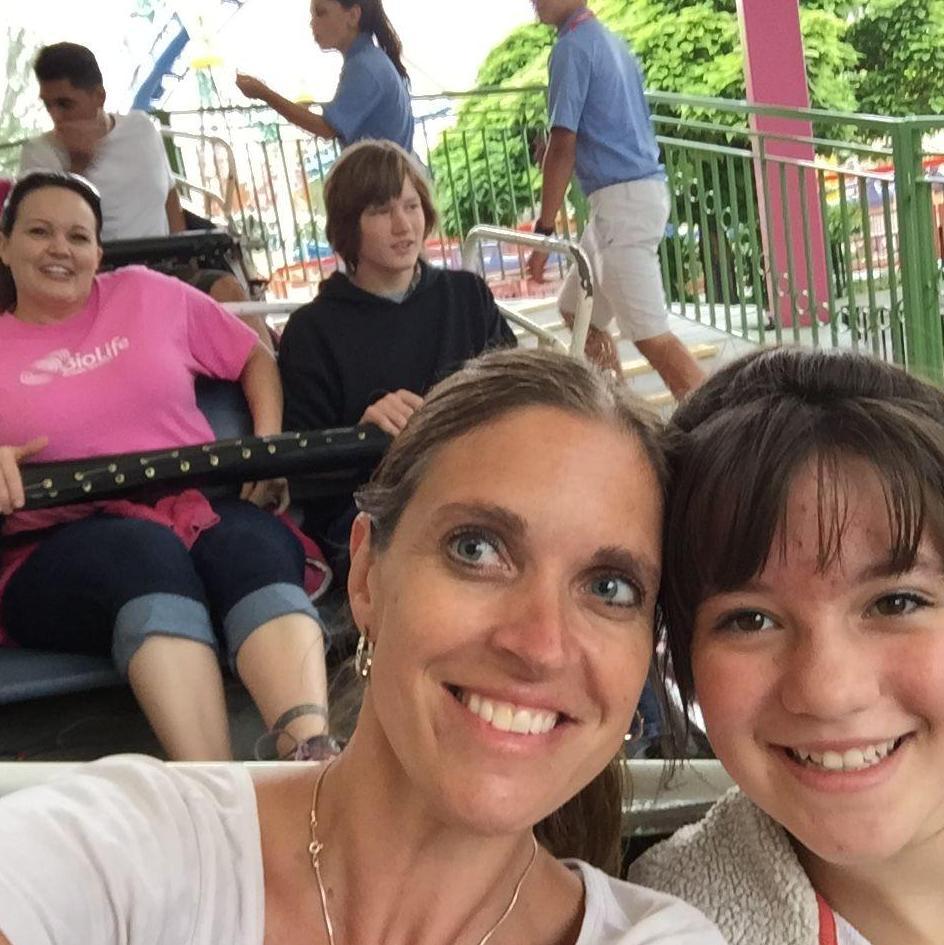 Savannah and her Aunt Liz at Lagoon! You can see Mindy (Savannah's Mom) and Eric (Savanah's brother) in the back!
