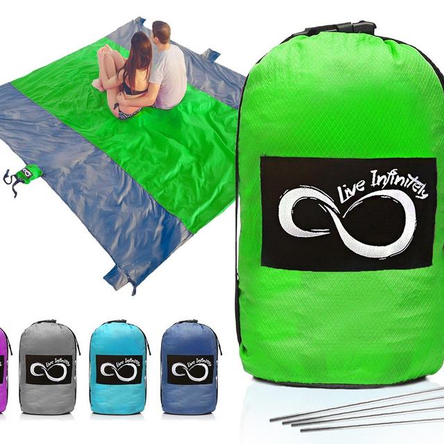 Sand Free Compact Outdoor Beach / Picnic Blanket- Huge-9’ x 10’ For 7 Adults- Best Mat For Festivals & Hiking-Very Soft & Quick Drying Ripstop Nylon- 5 Weightable Pockets + 4 Anchor Loops & Stakes