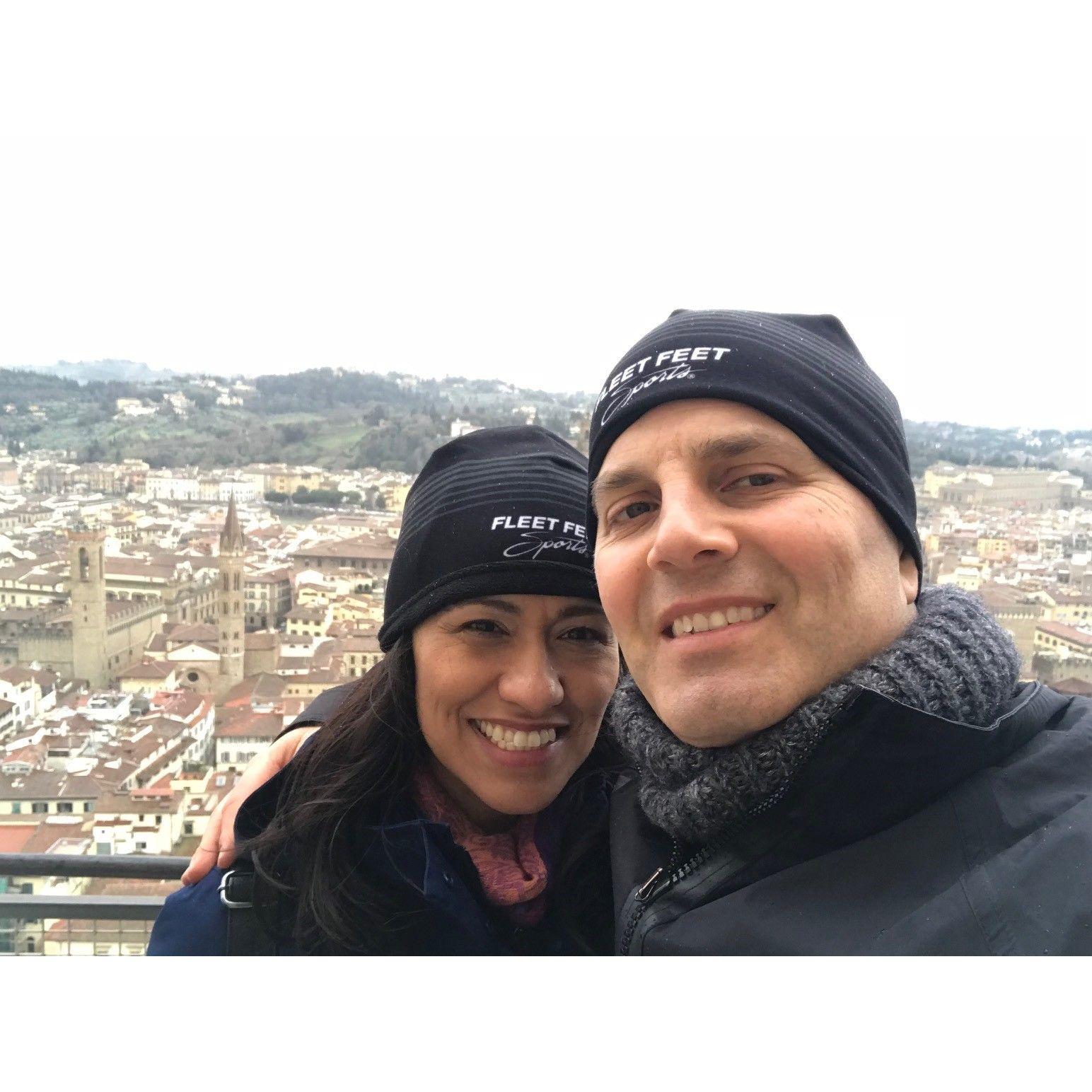 After climbing to the top of the Duomo in Florence, Italy.  Seeing the matching running hats, we wonder if we will be one of those couples who wear matching t-shirts when we are older.