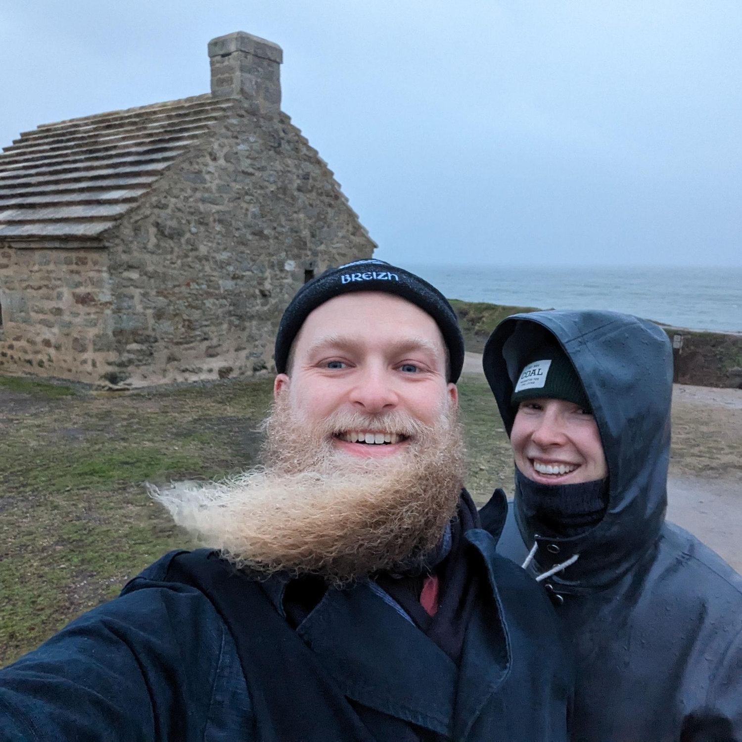 On the shore of Brittany. Buildings are made out of heavy rocks to withstand the winds :-)