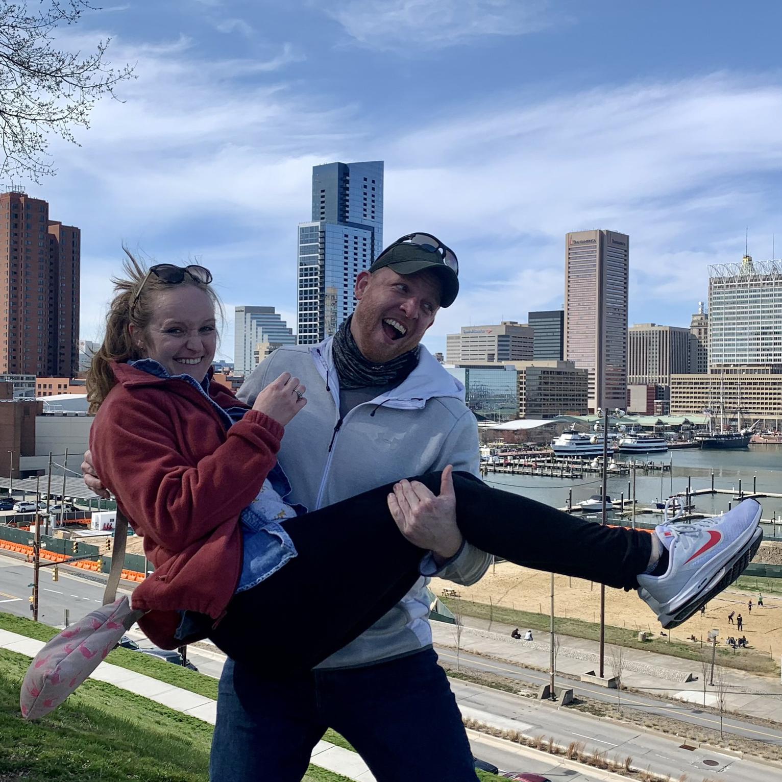 Eric pretending to throw Emily in the Inner Harbor! April 3, 2021.