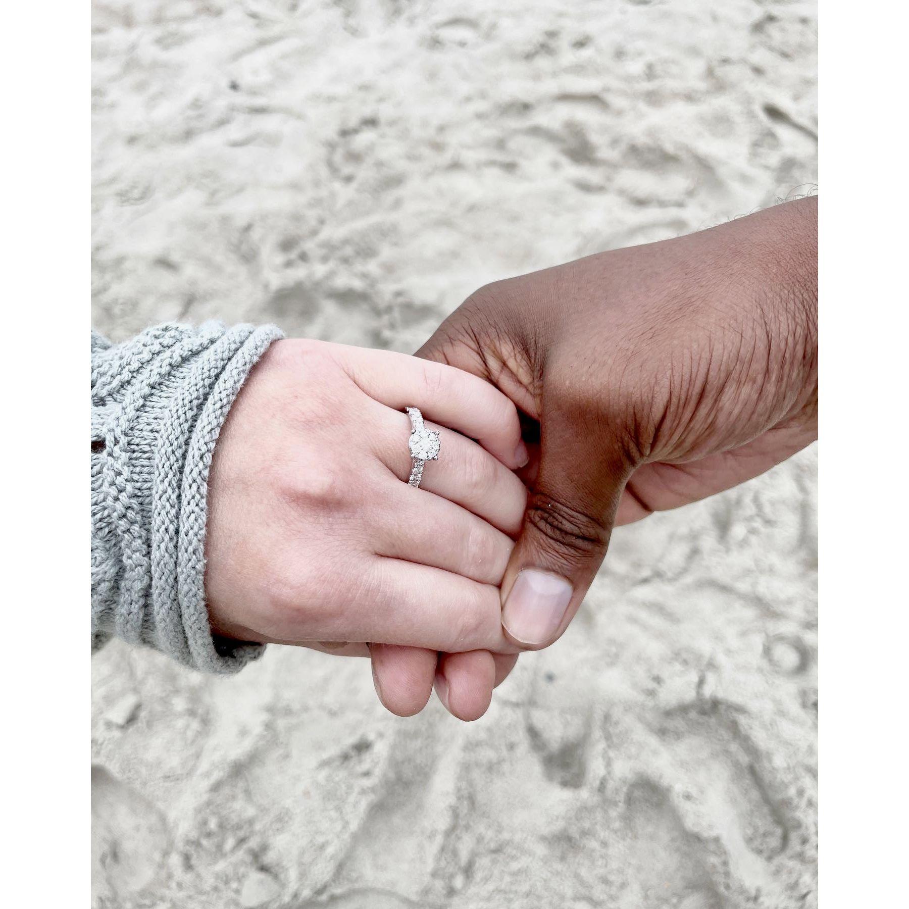 A surprise beach proposal at sunrise