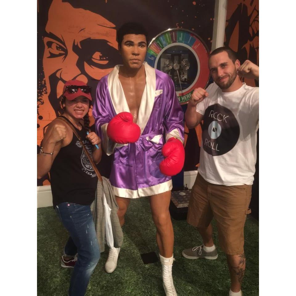 This was taken by my future mother in law in England at Madame Tussauds. Having fun with Muhammad Ali!
