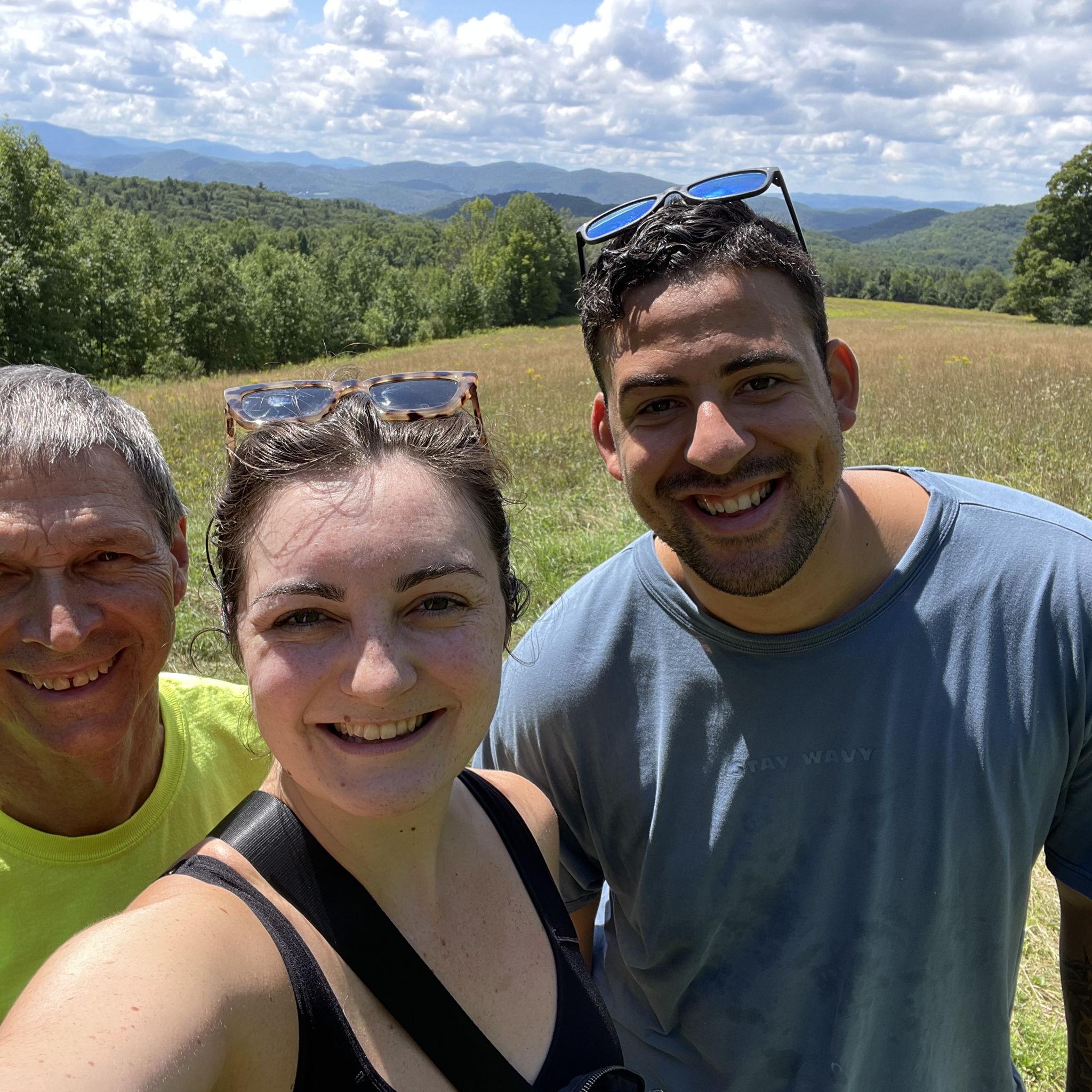 Micah meets Chris, Julie's step-dad. Beautiful hike on our property in Vermont.