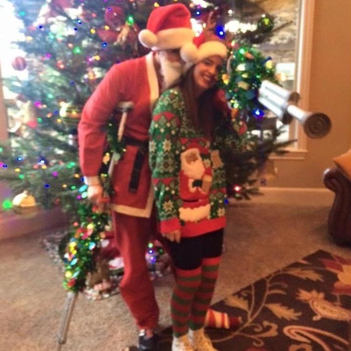 Mike with his infamous crutches at Santacon 2015.