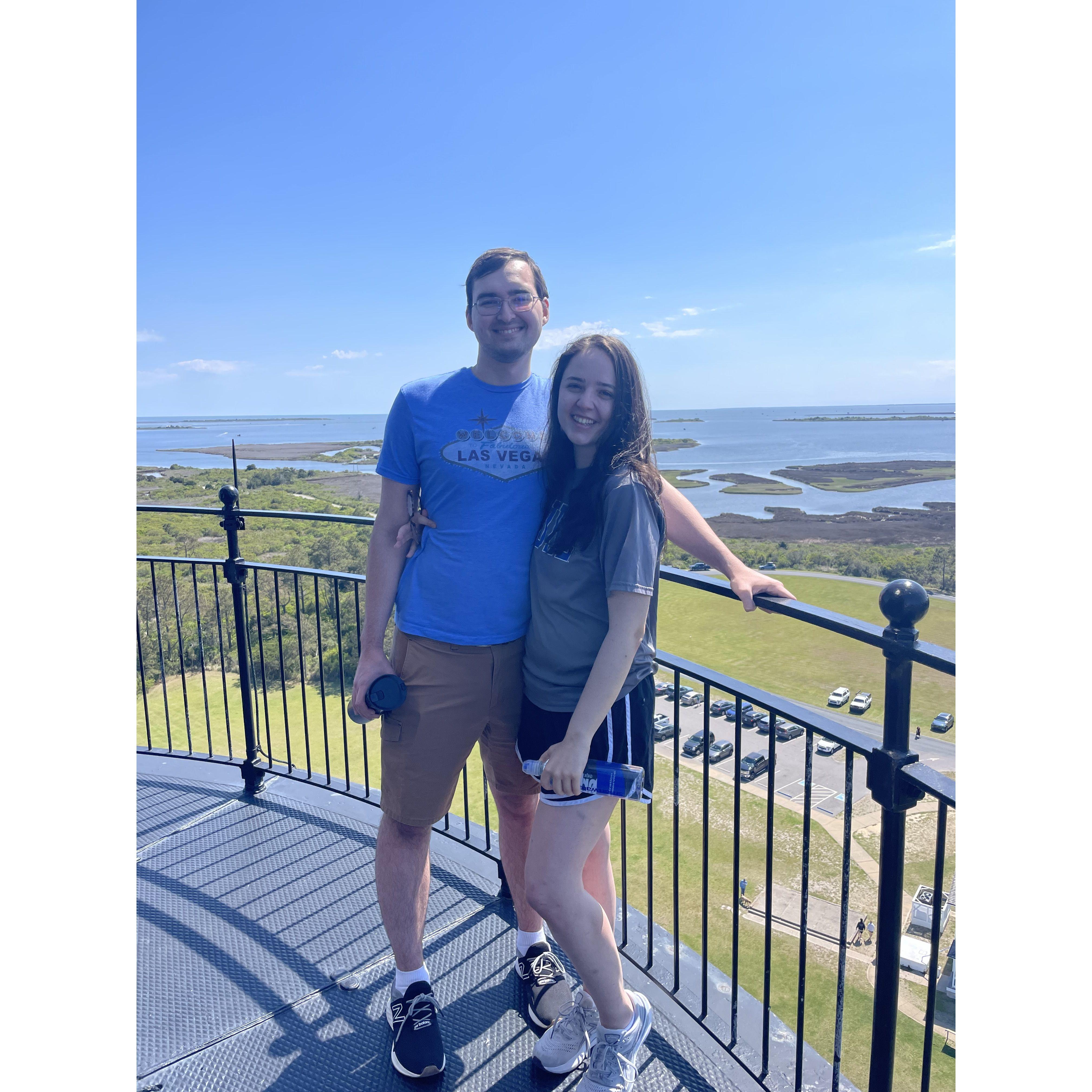 At the top of Bodie Island lighthouse in 2023. Little did I know then that we would get engaged in this same exact spot!