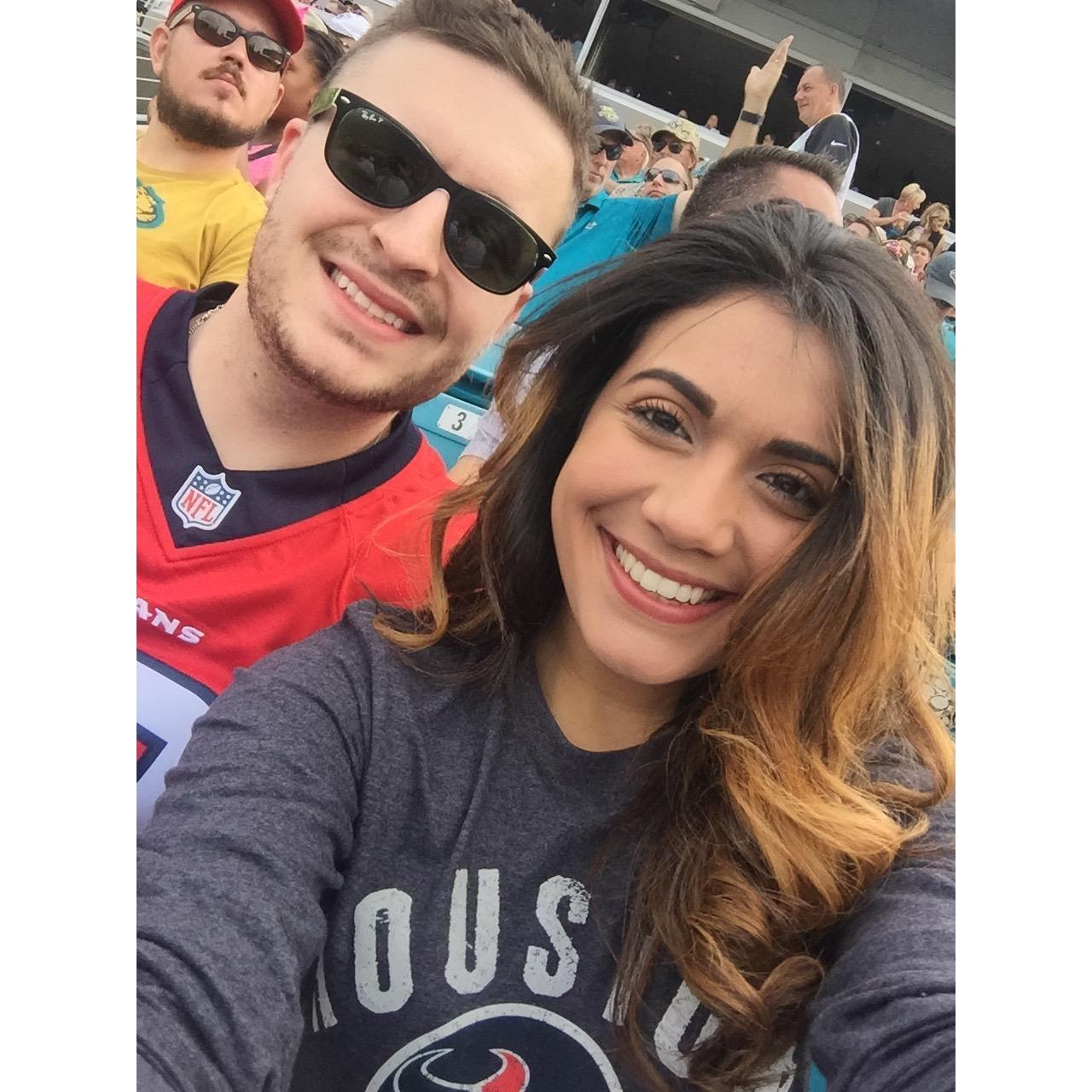 He loved her even when she had a bad hairstyle! THAT'S LOVE!! Jacksonville, Florida 2016 
Jaguars v Texans