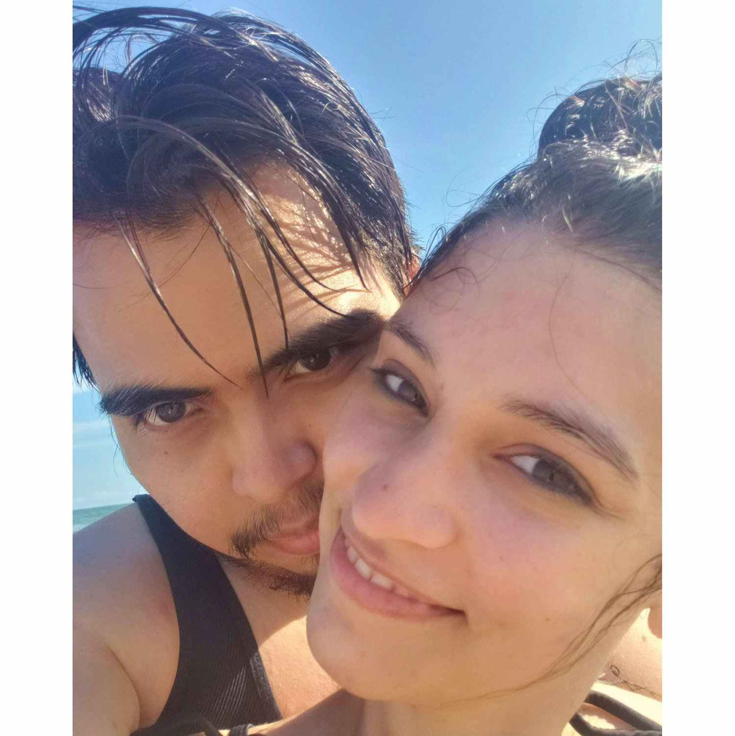 Josie kept "accidentally" pushing Salomon under whenever a wave came during their visit to Galveston.