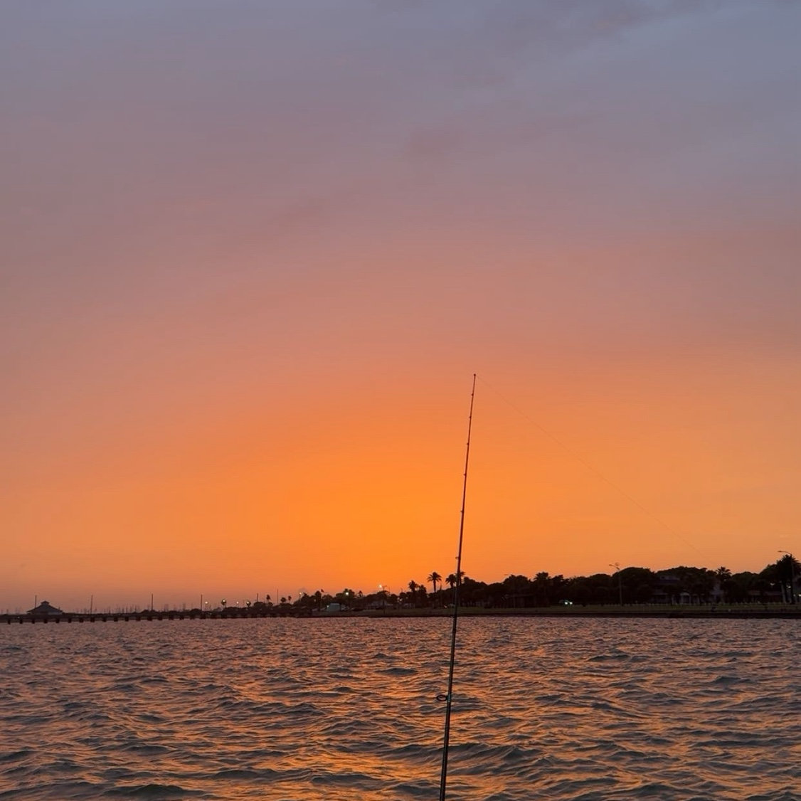 Maddie’s always taking pictures of sunsets while fishing- This one is at the pier in Palacios