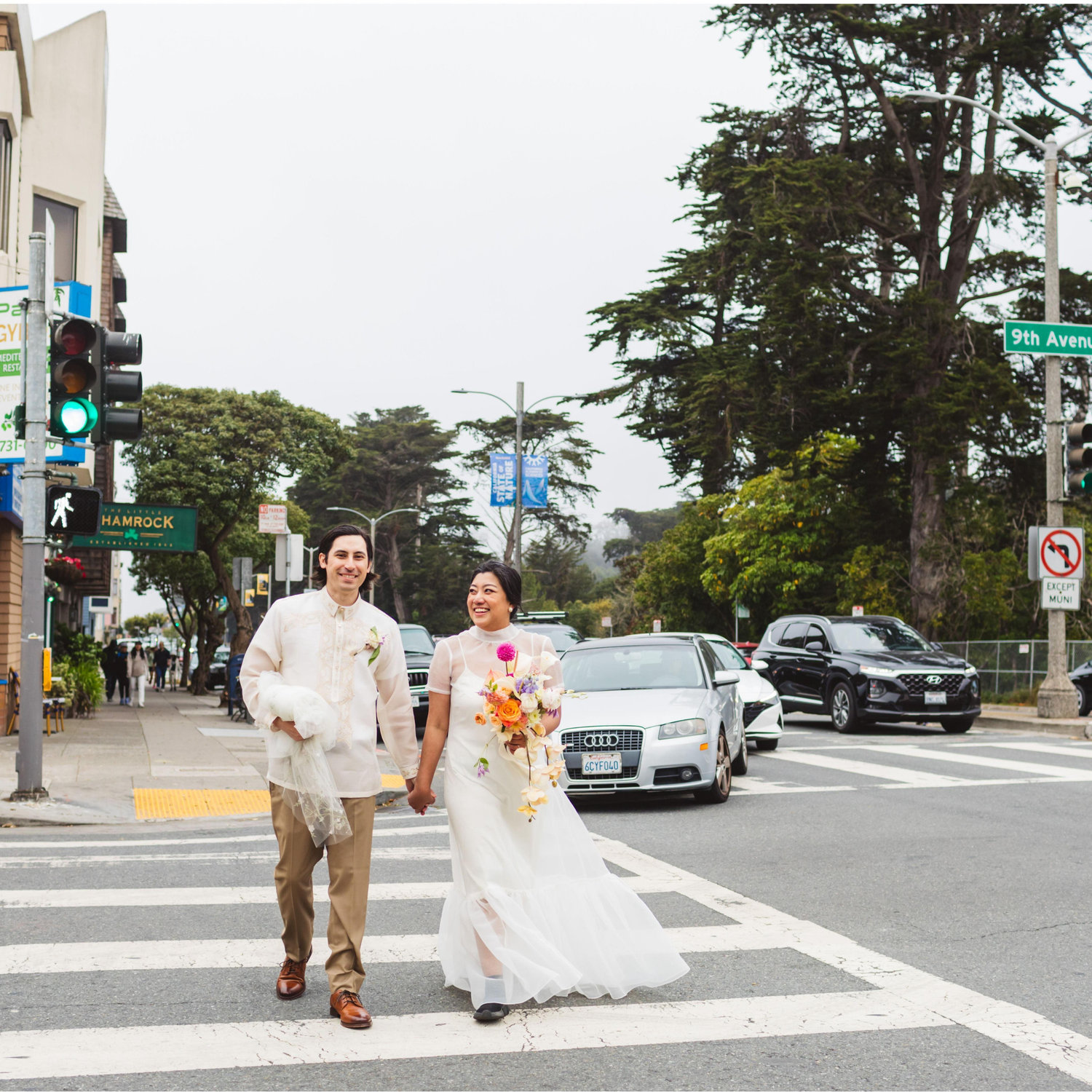 If you look closely, I'm wearing my photographer's shoes here! Our angel photographer swapped shoes with me when I couldn't walk in them anymore. (Even though I only had to make it across the street!)