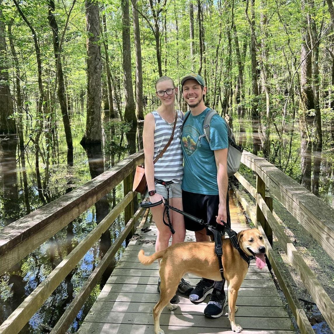 Our first national park together was Congaree in South Carolina. It was also the first time we said "I love you"! Here we are with Courtney's family dog, Teddy.