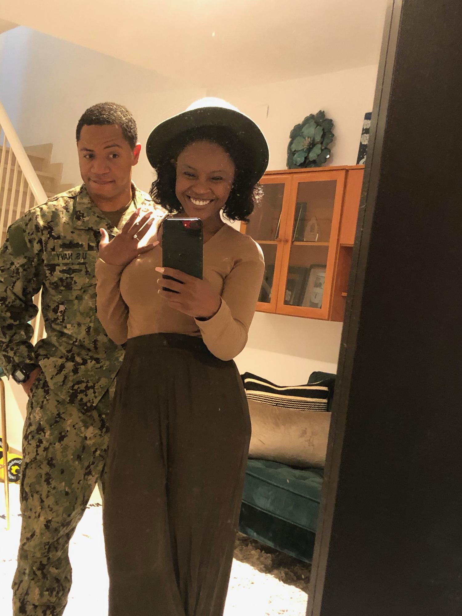 Travis proposes to Isha at their home while cooking empanadas. October 28, 2020