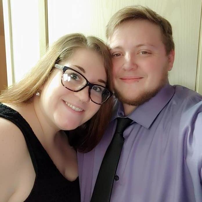 Us all dressed up to go out to celebrate our engagement by eating at The Melting Pot.